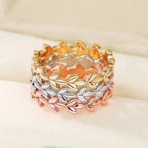 Drie-delige set stapelbare lauwerblad ringen in goud, zilver en rose goud afwerking
