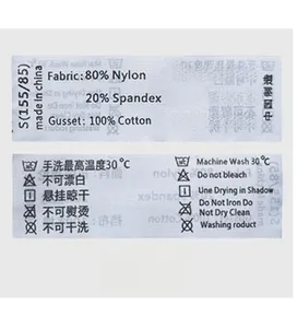 Detail of the wash label showing 80% nylon and 100% cotton crotch fabric composition