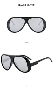 Detail view of black frame sunglasses with silver lenses in front and side angles