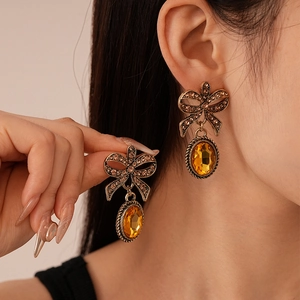 Retro bow crystal drop earrings with amber stones for women in a luxury vintage style
