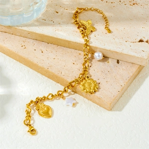 Gold layered stainless steel chain bracelet with butterfly, heart, and flower charms