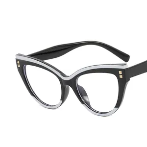 Cat eye blue light blocking glasses with black and white frame and gold studs