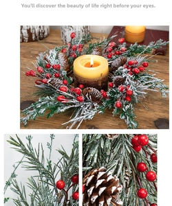 Close-up of frosted pine needles, red berries, and natural pine cones on a Christmas wreath