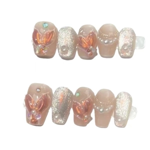Handmade mermaid pearl press-on nails with 3D butterfly and pink cat eye glitter effect