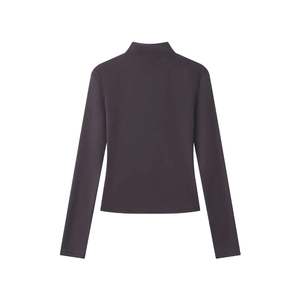 Detail view of the back of a slim fit long sleeve high neck athletic top in dark purple