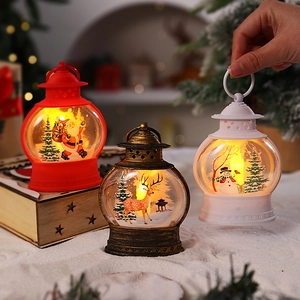 Set lanterne natalizie a LED con motivi di Babbo Natale e pupazzo di neve in rosso e bronzo