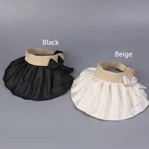 Women's jacquard sun visors in black and beige with bow knots and wide straw brims