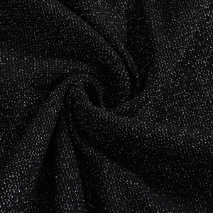 Detailed texture of black glitter fabric with silver sequins for elegant long dresses