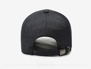 Detail view of grey casual men's baseball cap featuring a textured fabric and metal buckle