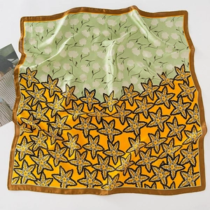 Silk square scarf with green floral and yellow maple leaf print on white background