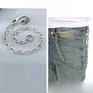 Close-up of heavy duty stainless steel pants chain with dragon head clasp on denim