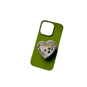 Green silicone phone case featuring a silver heart-shaped mirror pop socket stand