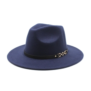 Detail of navy blue wool fedora hat featuring a stylish black band and gold chain accent