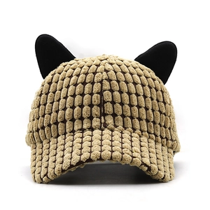 Detail of the cat ear design and textured bubble fabric on this warm winter baseball cap