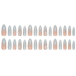 Almond cat eye press-on nails with silver glitter and rhinestone accents in 30pcs set