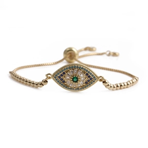 Gold evil eye bracelet with colorful stones and adjustable bead chain on white background