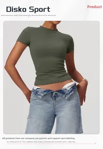 Detail of dark green quick-dry yoga t-shirt paired with stylish cuffed denim jeans