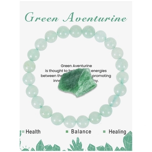 Macro shot of green aventurine beaded bracelet with natural healing stone crystal detail