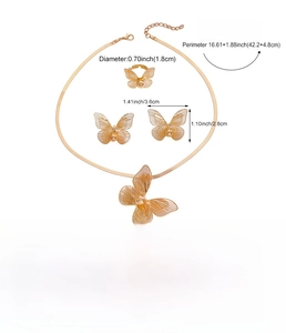 Detailed view of gold hollow butterfly jewelry set with size dimensions and weight