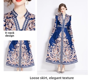 Close-up of V-neck and baroque paisley print on a navy vintage long-sleeved maxi dress