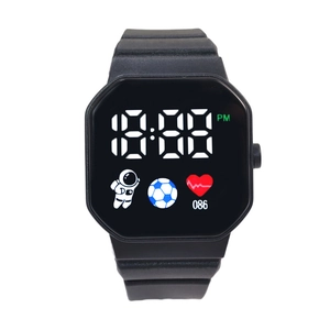Digital LED watch with astronaut design and black silicone strap on white background