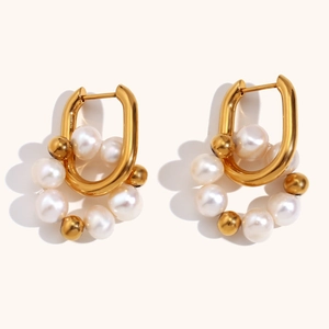 U-shaped 18K gold plated stainless steel earrings with freshwater pearl bead accents
