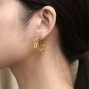 Chic multi-layered geometric gold hoop earrings with polished metallic finish for women