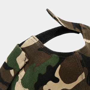Detail of adjustable velcro strap on camo brimless docker hat with reinforced stitching