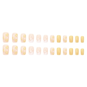 Short square press-on nails featuring sweet yellow daisy patterns and white fluid marble art