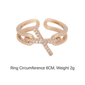 Adjustable copper ring with rose gold finish and pavé zircon X-shaped crossover design