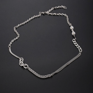 Minimalist double layer titanium steel necklace with white pearls on a black background