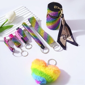 Detailed set of rainbow rhinestone keychain accessories with plush heart and tassel