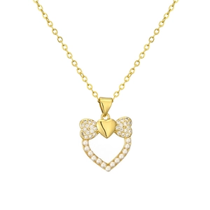 Collier élégant avec pendentif cœur doré, nœud papillon, perles et zircons brillants