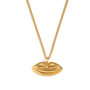 Detail of gold-toned plump lips pendant on a sturdy Cuban chain necklace