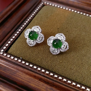 Elegant silver flower stud earrings with green center stone and white zircon petals