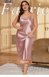Detail of dusty rose satin slip dress showing cowl neck and silky fabric texture