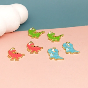 Detail shot of six colorful cartoon dinosaur alloy charms for DIY jewelry making