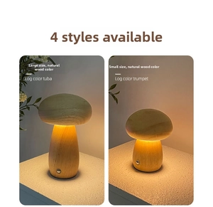 Macro detail of solid wood mushroom lamp showing two sizes with warm LED lighting