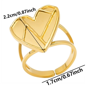 Detail view of adjustable gold heart ring with dimensions of 2.2cm heart and 1.7cm diameter