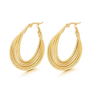 Gold stainless steel twisted hoop earrings with layered texture in teardrop shape