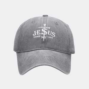 Close-up of the Jesus Saved My Life embroidery and washed grey cotton fabric of the cap