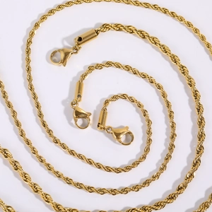 Three 18K gold plated stainless steel rope chains with lobster clasps on white background