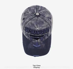 Detail of vintage washed denim baseball cap with 1978 embroidery and distressed brim