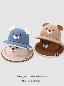 Detail of children's cotton bucket hats with bear ears in blue, beige, white, and brown