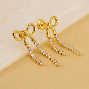 Elegant gold bow earrings with long sparkling zircon tassel pendants for women