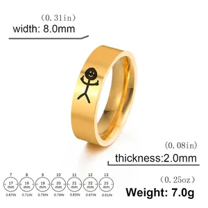 Anillo de acero de titanio dorado con grafiti de dibujos y tabla de tallas detallada
