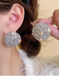 Macro shot of silver circular stud earrings featuring micro-pave sparkling crystals