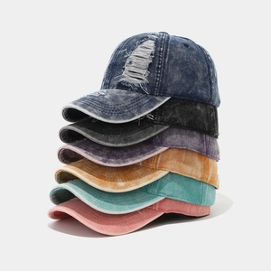 Distressed washed denim baseball caps in six colors with vintage ripped hole details