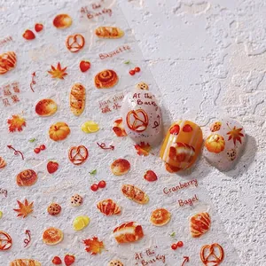 Adesivi per unghie 5D autunnali con croissant, bagel e foglie di acero per nail art chic