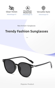 Detailed view of black round oversized sunglasses with metallic hinge and anti-slip tips